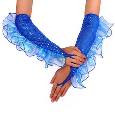 two hands wearing blue gloves and holding each other