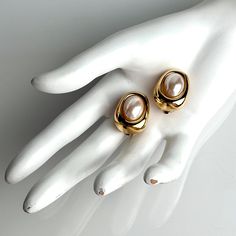 Vintage 90s Bijoux Givenchy Earrings Glass Pearl Polished Gold Plated Modernist Minimalist Clip On SIGNED. Gorgeous Vintage 90s Bijoux Givenchy Clip On Earrings. A Minimalist Aesthetic By Givenchy. These Lovely Earrings Feature A Unique Modernist Shape Finished In Polished Gold Plating. An Oval Shaped Glass Pearl Sits Center. Made Of Gold Plating With Classic Clip On Style Backs. Givenchy Always Does It Right. A Perfect Classic Earring To Compliment Your Wardrobe Looks. These Are Beautiful Earri Classic Metal Clip-on Earrings For Evening, Luxury Metal Clip-on Earrings For Formal Occasions, Givenchy Earrings, Classic Earrings, Lovely Earrings, Minimalist Aesthetic, Vintage Wear, Gold Plating, Clip On