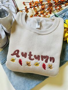 The cutest simple Autumn Leaf Embroidered design, perfect for fall lovers. Made on a Hanes Eco Smart or Gildan Crewneck. Message shop if interested in comfort colors. Fall Embroidered Sweatshirts, Pastel Wardrobe, Autumn Embroidery, Fall Lovers, Embroidery Tshirt, Women Sweatshirt, Embroidered Crewneck, Valentine Birthday, Sweatshirt For Women