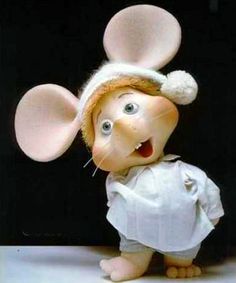 a very cute rat with some ears on it's head wearing a white shirt