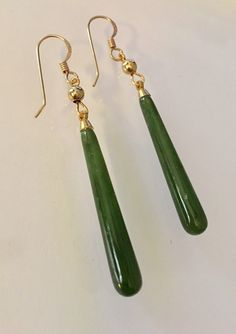 "These gorgeous grade A undyed jade smooth drop earrings are accented with gold plated beads and measure  2.25\" from 14k gold filled French ear hooks.  We also have these earrings available with sterling silver bead cap, beads and ,925 solid sterling silver ear wires . Thank you for visiting Lucy Isaacs Jewelry!" Jade Earrings, Earrings Elegant, Funky Jewelry, Jewelry Lookbook, Jade Carving, Jade Jewelry, Earrings Long, Dream Jewelry, Ear Jewelry