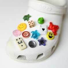 Shoe charm made using secondhand materials, fits standard crocs. Made with secondhand materials (the piece that attaches to the shoe is not secondhand). Crocs Jibbitz Pack, Croc Jibbitz Storage, Crocs Charms Music, Crocs Lucky Charms, Womens Crocs Charm, Crocs Whit Charms, Crock Pins Shoes, Crocs With Rainbow Charms, Crocs Shoe Keychain