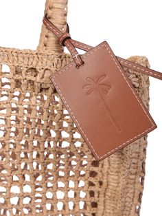 Two top handles Open top Main compartment Rectangle shape Woven raffia design Branded tag to the front Color: beige Depth: 9cm Height: 32cm Widht: 30cm 100% Raffia Composition: 100% Raffia Beige Bag, Woven Raffia, Ring Watch, Sneaker Wedge, Pendant Rings, Brand Tags, Luxury Shop, Open Top, Rectangle Shape