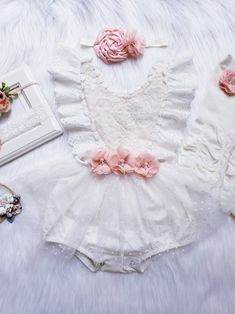 Cute Lace Baptism Dress, Cute Spring Lace Baptism Dress, Cute Cream Baptism Dress For Summer, Spring Baptism Cream Bubble Romper, Elegant White Jumpsuits And Rompers With Lace Trim, Elegant White Jumpsuits With Lace Trim, Elegant White Jumpsuit With Lace Trim, Cream Bubble Romper With Ruffles For Baptism, White Bubble Romper For Summer Parties