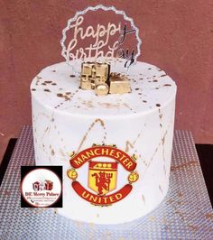 a manchester united birthday cake on a table