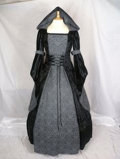 This is for a custom made dress,it will be made to the measurements you send me.Please send me your bust,waist and hip measurement,and please measure from the top of your shoulder to the floor with shoes on.It will be made with beautiful black crushed velvet and stunning grey and black jacquard.It will have a corset style front and back with black lacing so you can adjust the dress to fit your body shape.Combined shipping on multiple items.If you purchase express shipping by courier please send Gothic Fitted Gown For Fancy Dress, Fitted Gothic Gown For Fancy Dress, Customizable Length Ball Gown With Fitted Bodice, Gothic Fitted Gown For Costume, Fitted Gothic Gown For Costume, Costume Dress With Boned Bodice And Fitted Design, Fitted Gothic Ball Gown, Fitted Costume Dress With Boned Bodice, Fitted Ball Gown Dresses For Costume Party