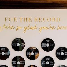 there are many records on the wall with gold foil lettering that says for the record we're go glad you're here