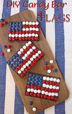 two patriotic desserts on a wooden board with the words diy candy bar flags