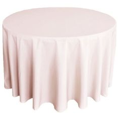 a round table with a white cloth on it