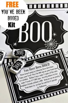 a halloween boo - boo sign and some candy bar wrappers