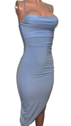 a mannequin wearing a blue dress with one shoulder and straps on the sides