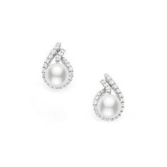 These stunning pearl and diamond studs are from the Mikimoto Laurel collection. Crafted in 18kt white gold, a 7mm Akoya cultured pearl is framed by a beautiful swirl of round-cut diamonds, accentuating its amazing aesthetics. The Mikimoto stud earrings have a simple, yet stupendous, style!