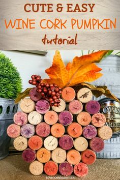 a wine cork pumpkin is sitting on top of a table