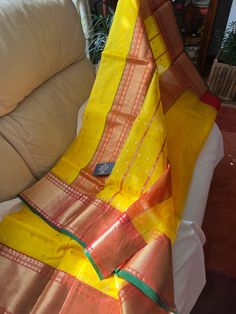 Chanderi Pure Handloom Handwoven Traditional With Blouse Saree's 🥻 👉🏻 Golden zari taraj naxi jakat Ariya eknaal ekjuttya havy adda border work saree  👉🏻 All Over eknaal golden zari sikka eknaal ghani butti work saree  Fabric :- 🧵 ~Katan~ Silk Saree🧵 Note:- fall pico not included code 87 Traditional Drape Dupatta With Kora Details, Tussar Silk Dupatta With Kora For Diwali, Bollywood Style Kora Dupatta, Yellow Bollywood Traditional Wear For Transitional Season, Yellow Traditional Wear With Zari Weaving, Yellow Anarkali Dupatta For Celebration, Transitional Season Anarkali Yellow Saree, Transitional Yellow Anarkali Saree, Yellow Traditional Wear For Festive Season