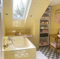 a bath room with a sink a window and a shelf filled with towels on top of it