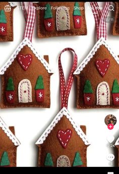 gingerbread house ornaments are hanging on the wall