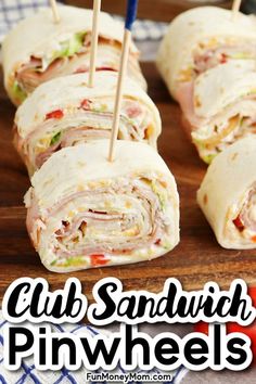 club sandwich pinwheels on a cutting board with toothpicks