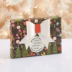 a christmas present box with a bow on it