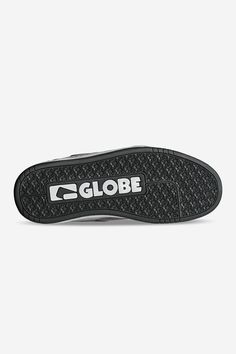 a pair of black and white shoes with the word globe written on the soles