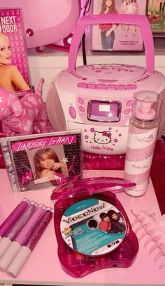 the contents of a barbie doll's bedroom are displayed on a pink countertop