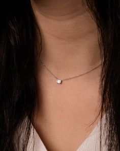 Add a sparkle of shine to your everyday look. This diamond bezel pendant set in your choice of 14k white or yellow gold is adjustable from 14 to 16 inches, enclosed by a lobster clasp. Its dainty style makes it perfect for everyday wear. Carat | 0.20 ctw (+/- .01cts)Clarity | VSColor | DEFCut | Emerald Note: In-stock products ship same-day or next-day depending on the time of your order. For made-to-order items please allow up to 1-3 weeks to ship your newest piece of fine jewelry. Everyday Diamond White Solitaire Necklace, Everyday Fine Jewelry Solitaire Necklace In Diamond White, Everyday White Gold Diamond Solitaire Necklace, Minimalist Solitaire Necklace In White Gold For Anniversary, Dainty Solitaire Necklace With Single Cut Diamonds For Everyday, Everyday Dainty Solitaire Necklace With Single Cut Diamonds, Everyday White Gold Jewelry With Bezel Setting, Everyday White Gold Jewelry With Single Cut Diamonds, Minimalist White Gold Diamond Necklace For Anniversary