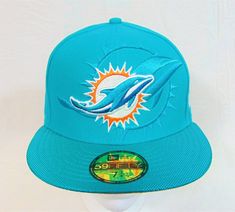 100% Authentic Guaranteed Brand New With Tags. New Era NFL Miami Dolphins 2016 On Field Sideline Collection Aqua & White & Orange 59FIFTY Fitted Hat Sz 7 1/4 RARE. Check Out the Pictures for more details.  Team: NFL Miami Dolphins  Size: Fitted 7 1/8 Unisex Color: Aqua & White & Orange Style: 11282869 Condition: Brand New Shipping: All Hats/Caps Are Shipped In Box All items come from a pet & smoke free home.  Hat 2 Nfl Miami Dolphins, Miami Dolphins, Orange Fashion, Fitted Hats, Dolphins, New Era, Miami, Caps Hats, Nfl