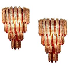 a pair of sculptural glass wall lights