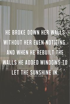 a person standing in front of a window with the quote he broke down her walls without her even noticeing and when he rebuilt