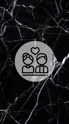 a black marble background with two people holding hands and the words love is in the center