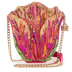 The 'Treasured Tulip' handbag blooms with vibrant beads, rhinestones, and sequins, creating a stunning floral masterpiece! With its rich pink and gold hues, this bag is as bold and elegant as a tulip in full bloom. 7.75 x 2 x 8" Strap Length End to End: 49" Strap Drop: 22" Non-removable crossbody chain strap with padded shoulder piece Magnet closure Inside pocket Fits a phone Vegan friendly Includes: metal logo fob, protective storage bag, certificate of authenticity This is a handmade item, eac Mary Frances Purses, Unusual Handbags, Mary Frances Bags, Novelty Handbags, Shoulder Piece, Novelty Purses, Mary Frances, Bridal Clutch, Novelty Bags