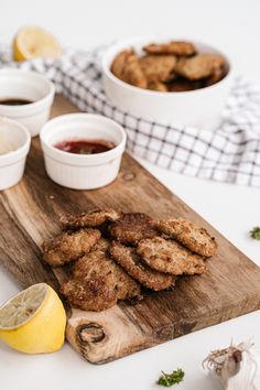 some fried food is on a cutting board