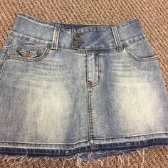 Never Worn, Plastic Thingy Still Attached But Tag Just Ripped Off.This Skirt Is Super Comfy Because Fabric Has Stretch!!!Love The Raw Denim Edge With Fades. Size 7/8 True To Size. Casual Skirt With Frayed Hem, Casual Skirt With Stretch And Frayed Hem, Casual Stretch Skirt With Frayed Hem, Ripped Denim Mini Skirt In Medium Wash, Ripped Medium Wash Mini Skirt, Distressed Blue Mini Skirt, Ripped High-waist Mini Skirt In Medium Wash, Denim Mini Skirt With Ripped Details, Raw Denim