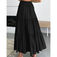 Black Cotton Blend Swing Maxi Skirt with Pockets Black Skirted Bottoms, Casual Black Tiered Skirt, Black Tiered Summer Skirt, Black Relaxed Maxi Skirt, Relaxed Black Maxi Skirt, Black Maxi Skirt For Summer, Black Tiered Maxi Skirt For Spring, Black Flared Maxi Skirt For Summer, Black Flowy Tiered Maxi Skirt