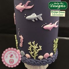 there is a cake decorated with sea animals on it