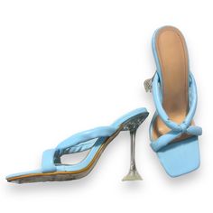 Discover Ultimate Comfort And Style With The Ulta High Heel. This Slip-On Shoe Is Made From Wear-Resistant Pu Leather With A Blue Finish, And Features A Rubber Outsole And Pu Leather Lining For Incredible Durability. Take Your Everyday Look To The Next Level! Good Condition/ Never Worn Ulta High Heel Heel Size: 4.5’ Slip On Size: 38 Wear- Resistant Pu Leather Blue Outsole Material: Rubber Lining Material: Pu Leather Light Blue Sandals For Spring Party, Light Blue Synthetic Sandals For Evening, Light Blue Open Toe Heels For Party, Light Blue Party Sandals For Spring, Trendy Light Blue Party Sandals, Light Blue Sandals With Padded Heel For Evening, Light Blue Evening Sandals With Padded Heel, Light Blue Evening Sandals With Wrapped Heel, Blue Open Toe Sandals For Cocktail