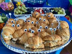 there are many croissants with googly eyes on them