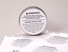 a close up of a tin of burning instructions