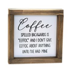 a framed sign with the words coffee spelled in cursive writing on it,