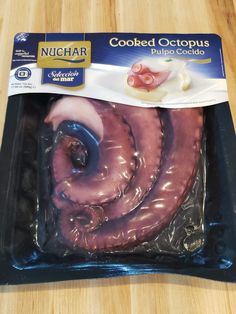 a package of cooked octopus wrapped in plastic