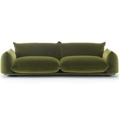 a green couch sitting on top of a white floor