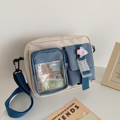 [{ product_title }}- Bobo's House Harajuku Style Blue Backpack Shoulder Bag, Cute Light Blue Student Bag, Cute Crossbody Shoulder Bag For School, Blue School Satchel, Blue School Satchel With Mobile Phone Bag, Kawaii Blue Shoulder Bag, Cute Everyday Crossbody Shoulder Bag, Blue Satchel With Mobile Phone Bag For School, Blue Harajuku Shoulder Bag For Daily Use