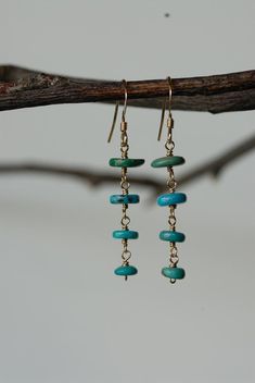 These earrings are beautiful and unique. They are a perfect addition to any outfit.  Each turquoise heishi bead was hand picked and wire hand formed to create the beautiful tiered style of these earrings.Thank you for supporting my small business! :)<3 Stephanie Turquoise 14k Gold Filled Drop Earrings, 14k Gold-filled Turquoise Jewelry With Ear Wire, Turquoise Bohemian 14k Gold-filled Earrings, Turquoise 14k Gold Filled Bohemian Earrings, Bohemian Turquoise 14k Gold-filled Earrings, Turquoise 14k Gold Filled Earrings, Bohemian Turquoise 14k Gold Filled Earrings, Turquoise Gold Bohemian Earrings, Turquoise 14k Gold-filled Earrings With Ear Wire