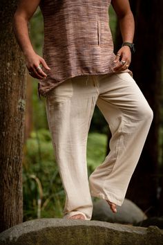 Introducing our handmade Marial Pants, crafted from 100% hand-woven khadi cotton. These soft and breathable trousers offer unrivaled comfort, perfect for yoga, festivals, and everyday living.The design features two conveniently placed pockets, adding a practical touch to your daily endeavors. Furthermore, a string tie allows for a personalized fit, ensuring maximum comfort and freedom of movement.These boho pants are suitable for both men and women, and specifically tailored to offer exceptional Fisherman Clothing, Burlesque Bra, Boho Pants, Funky Design, Cotton Kimono, Support Bras, Corset Style, Khaki Green, Color Khaki