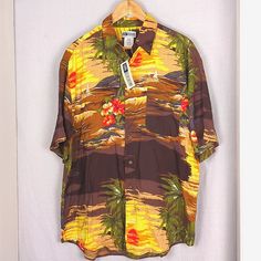 United Men's Tropical Print Short Sleeve Beach Button Down Shirt New With Tags, No Flaws 100% Rayon, Soft And Lightweight 4-Gn-24 Men's Size Large, Oversized Loose Relaxed Fit 25" Pit To Pit 32" Length All Items In This Closet Are Clean, Packaged Well, And Ship Quickly From A Smoke And Pet Free Environment. Reasonable Offers Considered. First Time Buying On Poshmark? Enter Code: Freedomstyle555 To Receive $10 Off Your First Purchase! Travel Beach Vacation Summer Spring Break Airport Casual Trave Brown Summer Beach Shirt, Brown Button-up Shirt For Vacation, Brown Button-up Beach Top, Brown Collared Beach Shirt, Yellow Hawaiian Shirt For Vacation, Yellow Short Sleeve Hawaiian Shirt For Summer, Casual Yellow Hawaiian Shirt For Beach Season, Yellow Summer Hawaiian Shirt For Beach Season, Casual Yellow Hawaiian Shirt For Beach