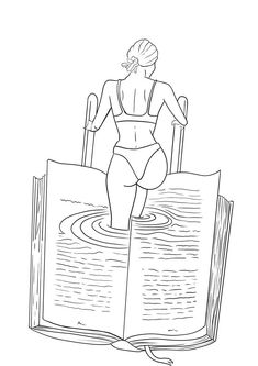 a woman in a bathing suit standing on an open book