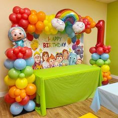 a birthday party with balloons and decorations