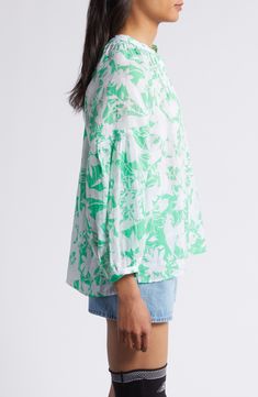 Welcome warm days with this lightweight, floral-print popover top framed by a split neck and billowy balloon sleeves. 23" center front length (size Medium) Split neck Long sleeves 60% ramie, 40% lyocell Machine wash, tumble dry Imported Relaxed Fit Split Neck Top For Vacation, Green V-neck Tops With Blouson Sleeves, Green Balloon Sleeve Blouse For Summer, Relaxed Fit Split Neck Vacation Blouse, Relaxed Split Neck Blouse For Vacation, Spring Split Neck Top For Daywear, Relaxed Fit Split Neck Blouse For Vacation, Spring Vacation Long Sleeve Peasant Top, Long Sleeve Peasant Top For Spring Vacation