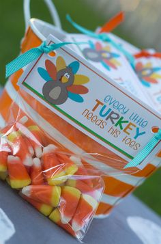 a bag filled with candy sitting on top of a table