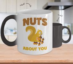 a coffee mug with the words nuts about you on it and an image of a squirrel