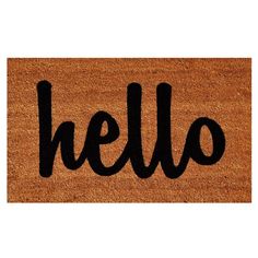 a door mat with the word hello written in black ink on it, against a white background